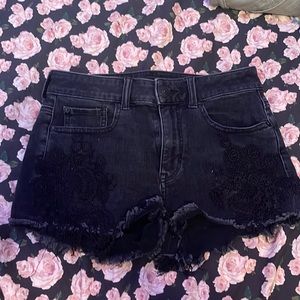 American Eagle black jean shorts. A super super stretch style and size US 4.